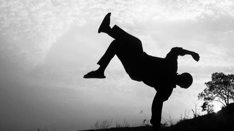 A silhouette of a breakdancer - photo credit: Taiye Salawu https://www.pexels.com/@taiyesalawu/